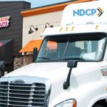 DD Store front with NDCP logo'd truck - cropped