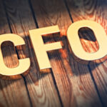 Acronym CFO on wood planks