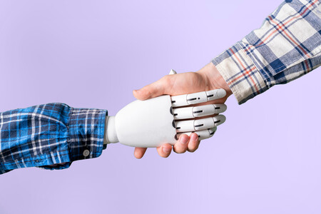 a human and machine robot hand shake hands, concept of future technology