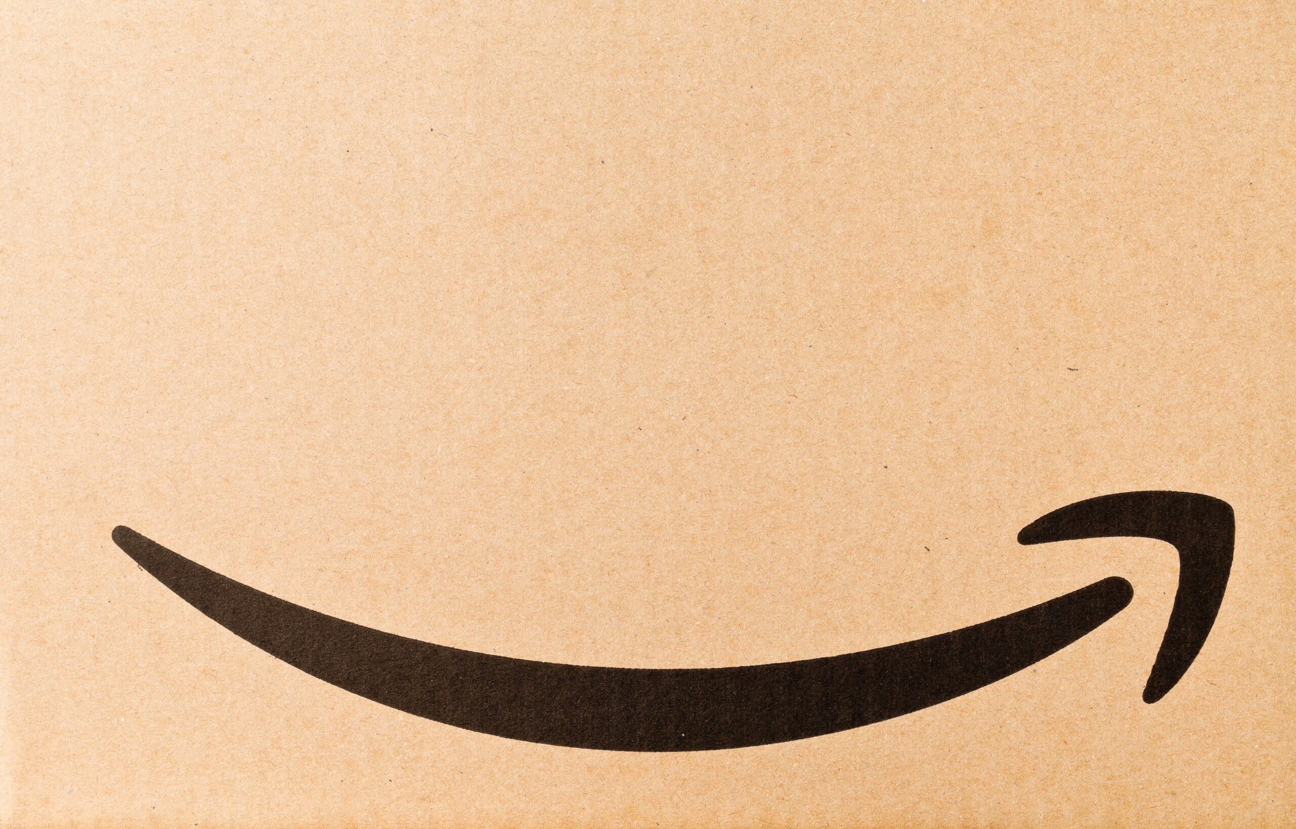 DRESDEN, GERMANY - APRIL 3, 2019 : Close up of Amazon logo on de