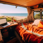 Interior of  camper van mobile home with table and ocean sea vie