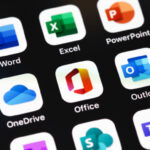 Microsoft Office (Word, Excel, OneDrive, Outlook and other mobile app on the screen iPhone. Microsoft Corporation is an American multinational technology company. Moscow, Russia - December 5, 2020