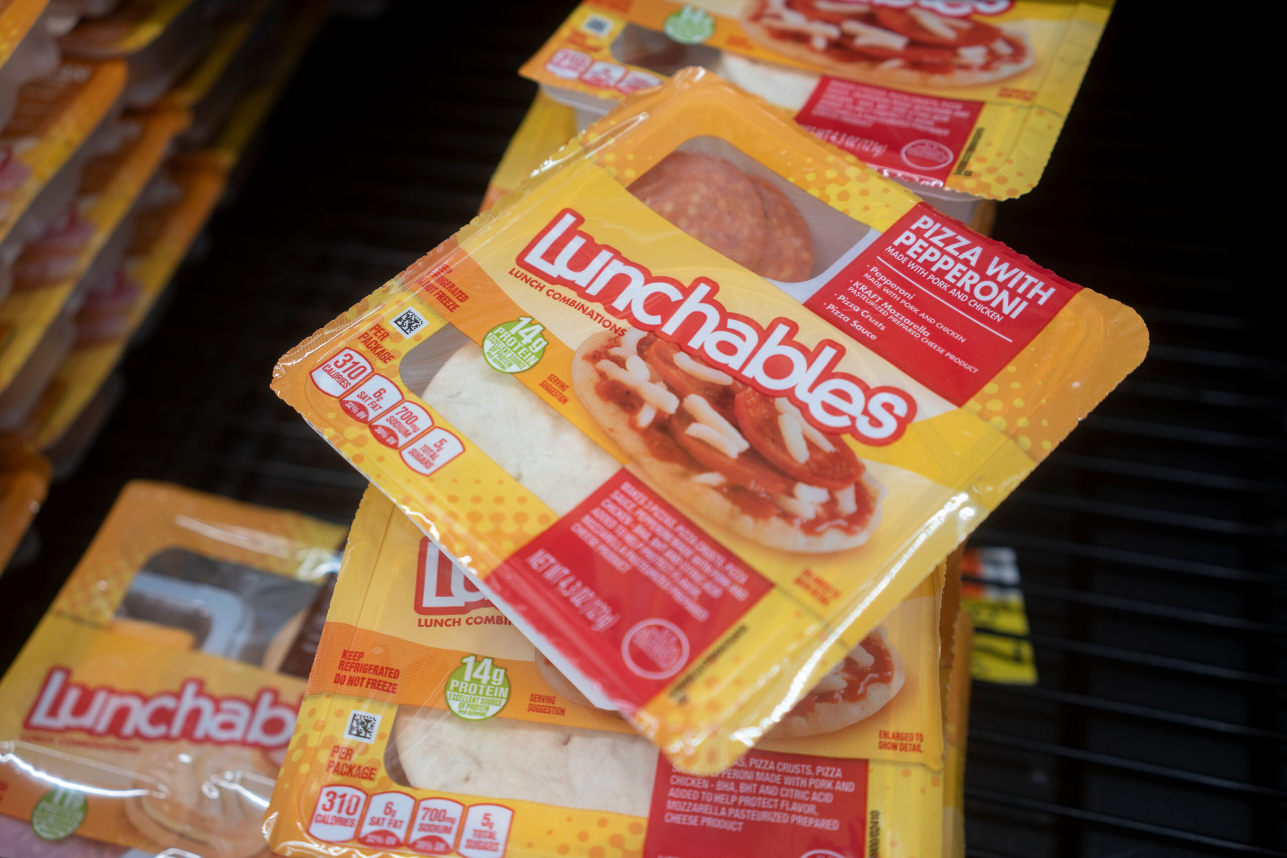West Linn, OR, USA - Sep 7, 2021: Lunchables Pizza with Pepperoni is seen in the cooler at a Walmart neighborhood market. Lunchables is a brand of food and snacks manufactured by Kraft Heinz.