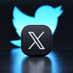 Valencia, Spain - July, 2023: X app logo in front of the Twitter blue bird symbol background in 3D rendering. X is the new name and logo of the social network Twitter owned by Elon Musk