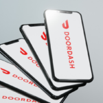 DoorDash logo displayed on smartphones.