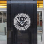 Homeland Security seal on the outside of a building in Washington, D.C. USA.