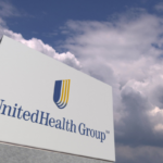 Logo of UNITEDHEALTH GROUP on a stand against cloudy sky, editorial 3D rendering