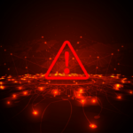 Warning attacker alert sign with exclamation mark on dark red background.