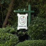 Augusta, GA, USA - May 15, 2015: An entrance to the Augusta National Golf Club in Augusta, Georgia. The Augusta National Golf Club is a private country club and home to the annual Masters tournament.