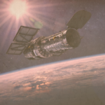 Image of the Hubble Space Telescope floating in space.
