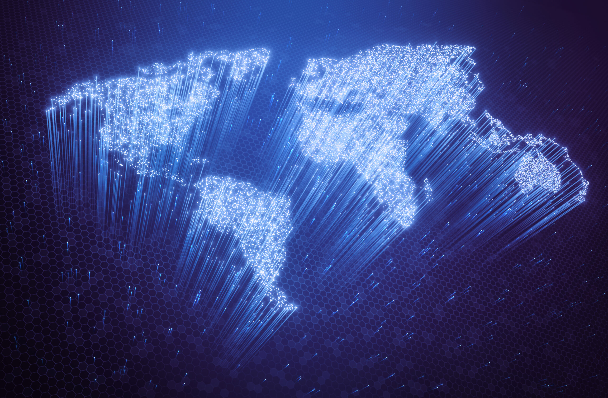 Optical fibers lit in the shape of the world map. 3D image concept of global communication by optical fiber.