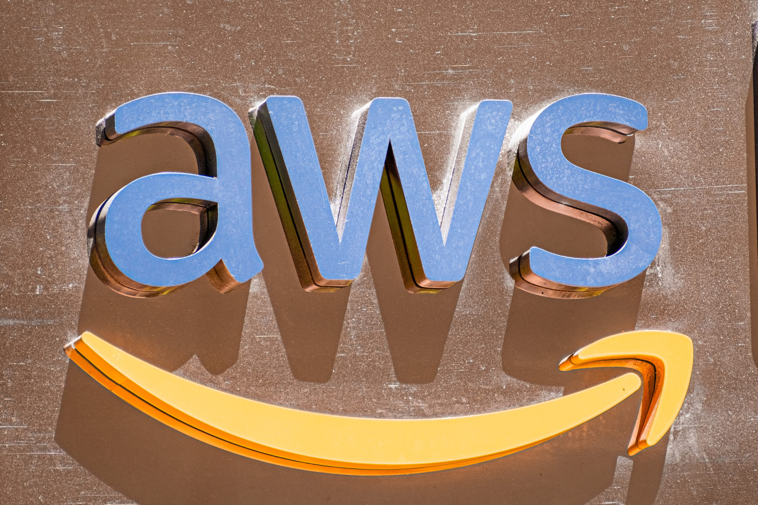 Close up of AWS sign at their offices in SOMA district; Amazon Web Services (AWS) is a subsidiary of Amazon that provides on-demand cloud computing platforms