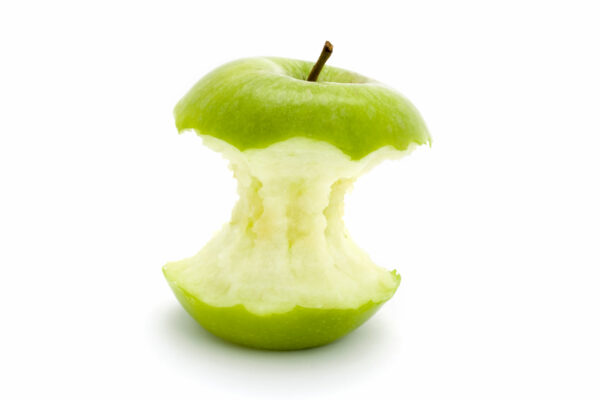 green apple core on a white background