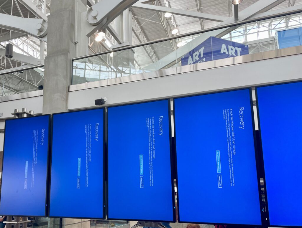 A major global system outage has left gate screens blue and blank at the Denver International Airport.
