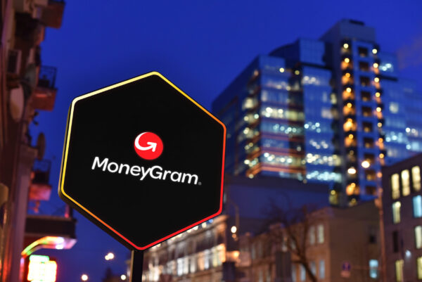 MoneyGram International Sign Against a dark night
