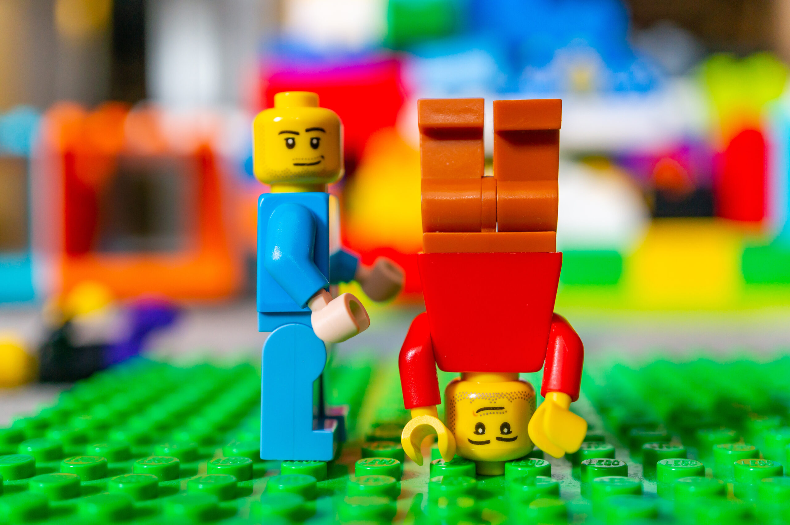 Lego figurines practicing a handstand