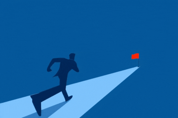 Businessman running to the goal red flag of victory