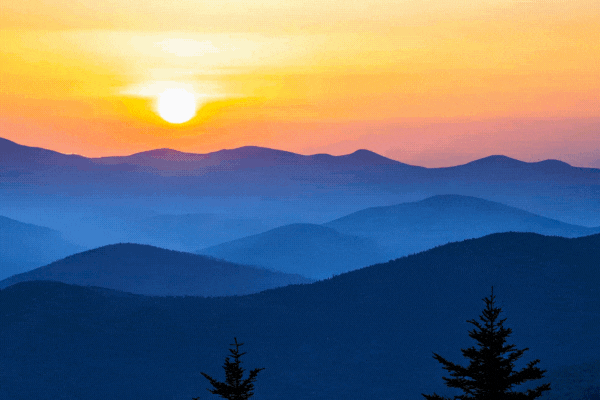 Sunset over blue ridge mountains with vibrant sky, scenic landscape. Natural beauty and tranquility concept