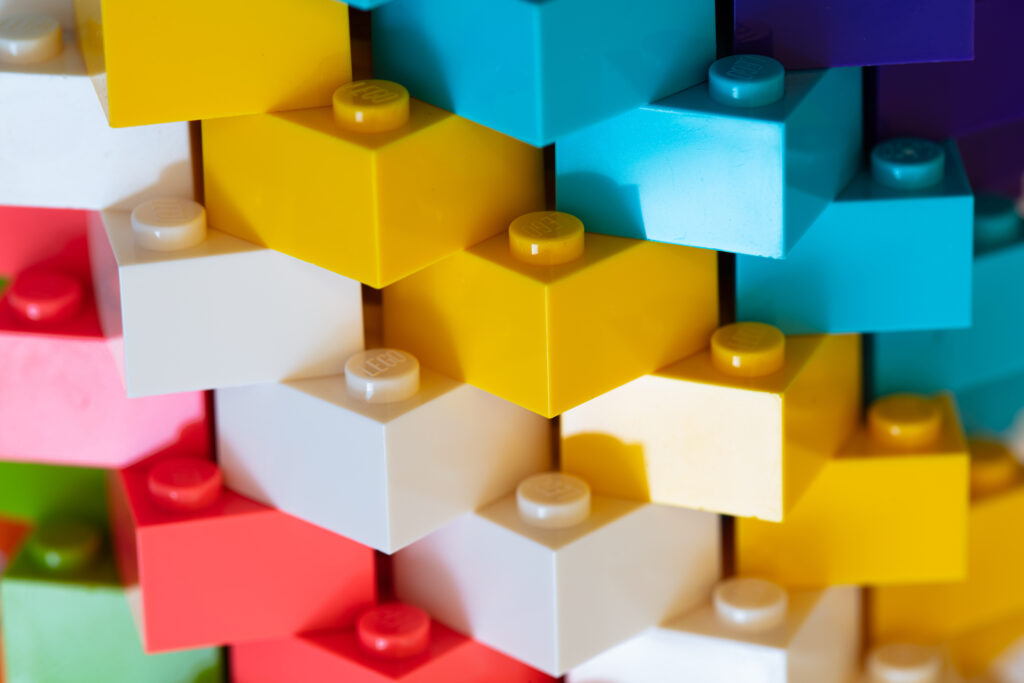 https://stock.adobe.com/images/closeup-of-multicolored-lego-blocks-built/909293046