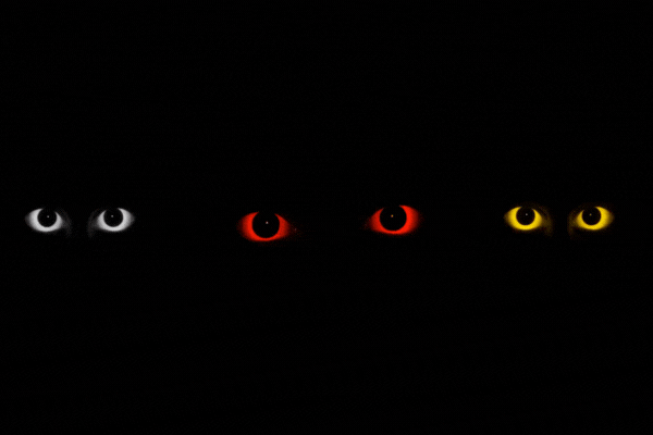 Minimalist Horror Scene with Multiple Glowing Eyes in Deep Darkness and High Contrast Lighting