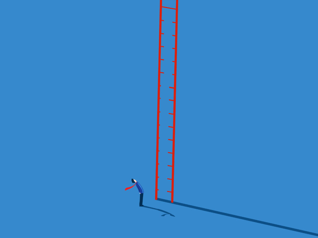 Businessman standing looking at broken ladder