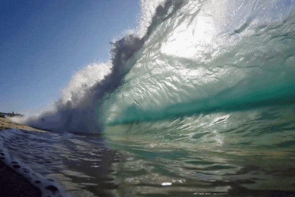 Waves crashing down on the shore