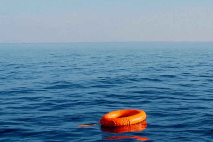 A life preserver floating in the open ocean