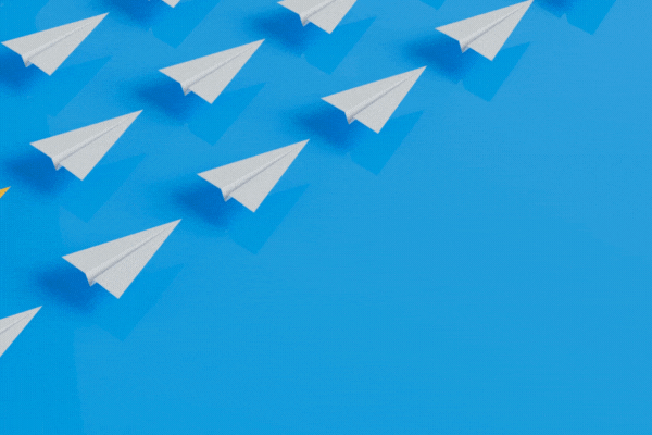 Mindset Business leadership, paper plane take the lead against other in the sky, achievement goal concept think differently idea.