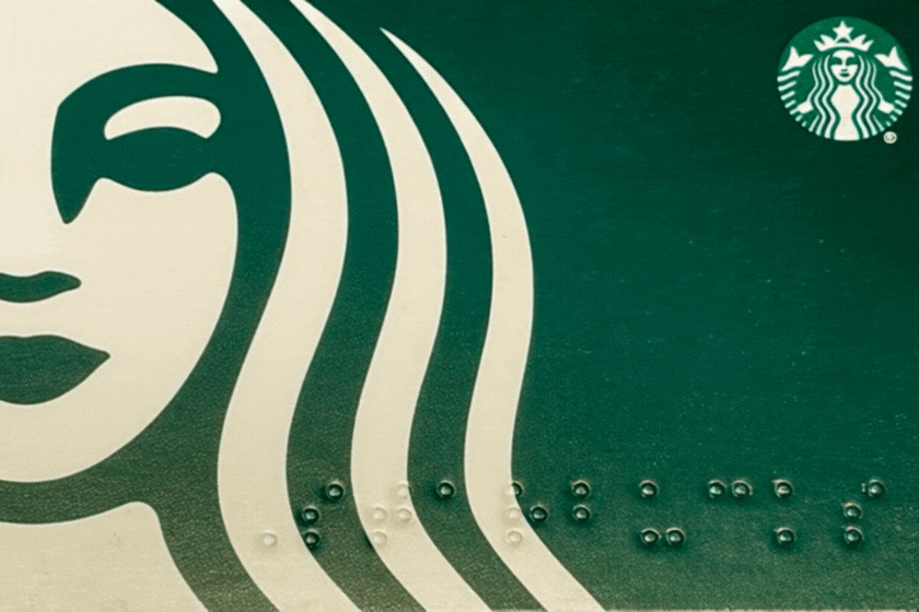 Starbucks git card in motion.