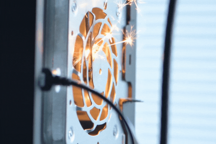 Short circuit and sparking inside the computer case. Danger of electronics failure.