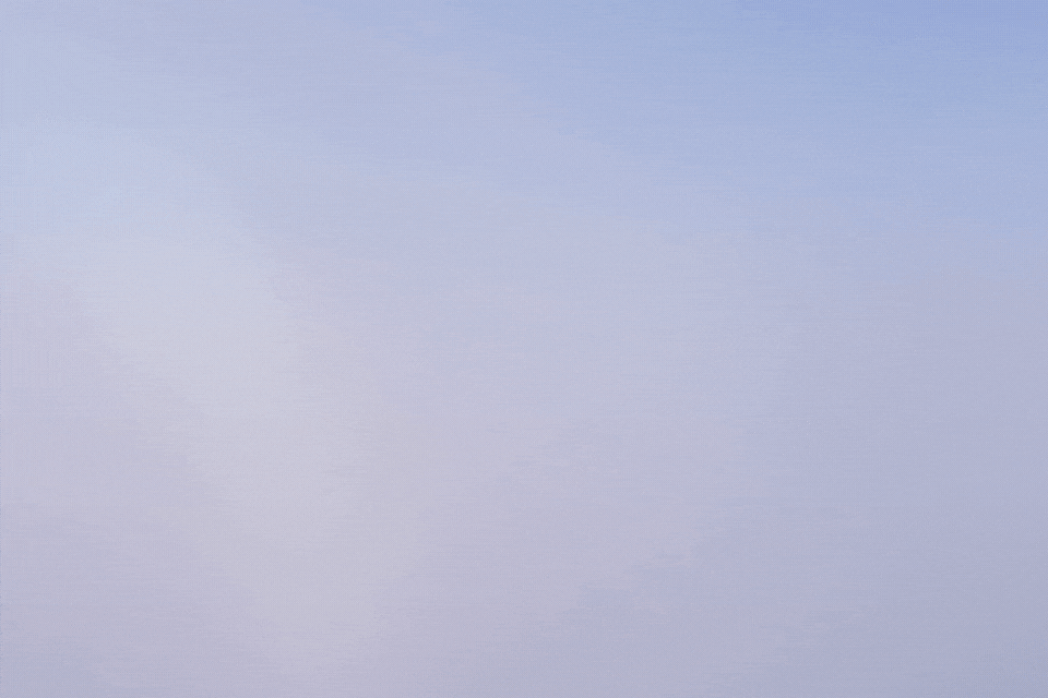 Discover breathtaking mountain peaks emerging from a sea of clouds in winter.