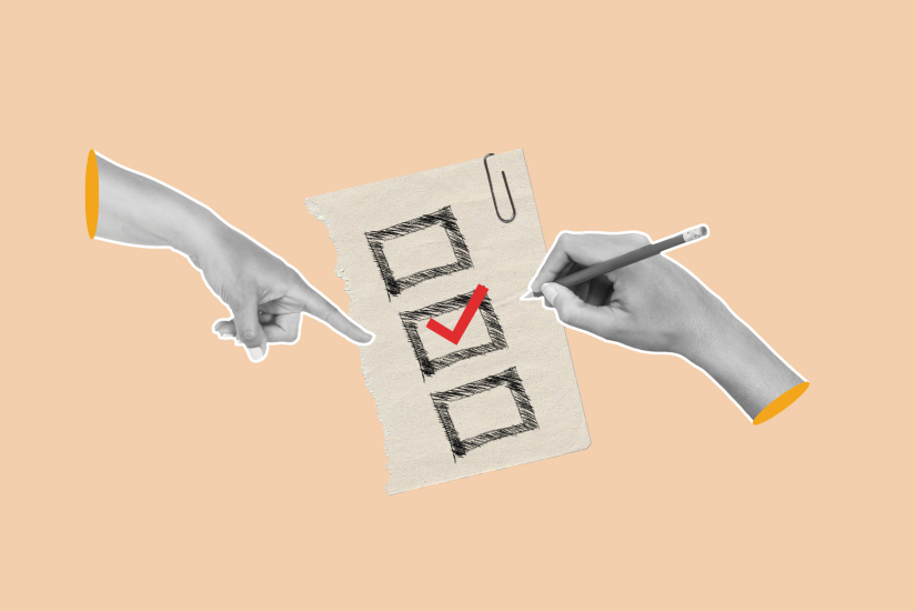 One hand pointing and one hand writing a red check sign on a beige background