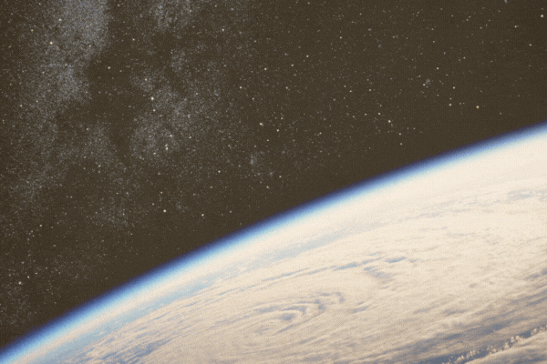 Space station deploys solar panels over planet Earth. 3d animation. 4k.