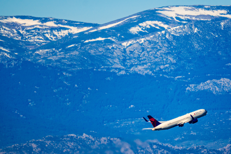 Delta Airlines plane taking off from Adolfo Suarez Madrid Barajas Airport