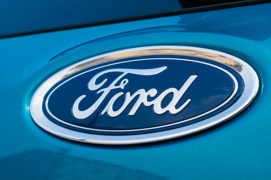 Ford motor company logo sign on a blue car
