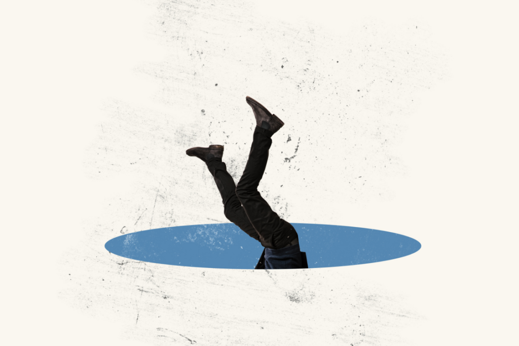 Man falling down into hole concept