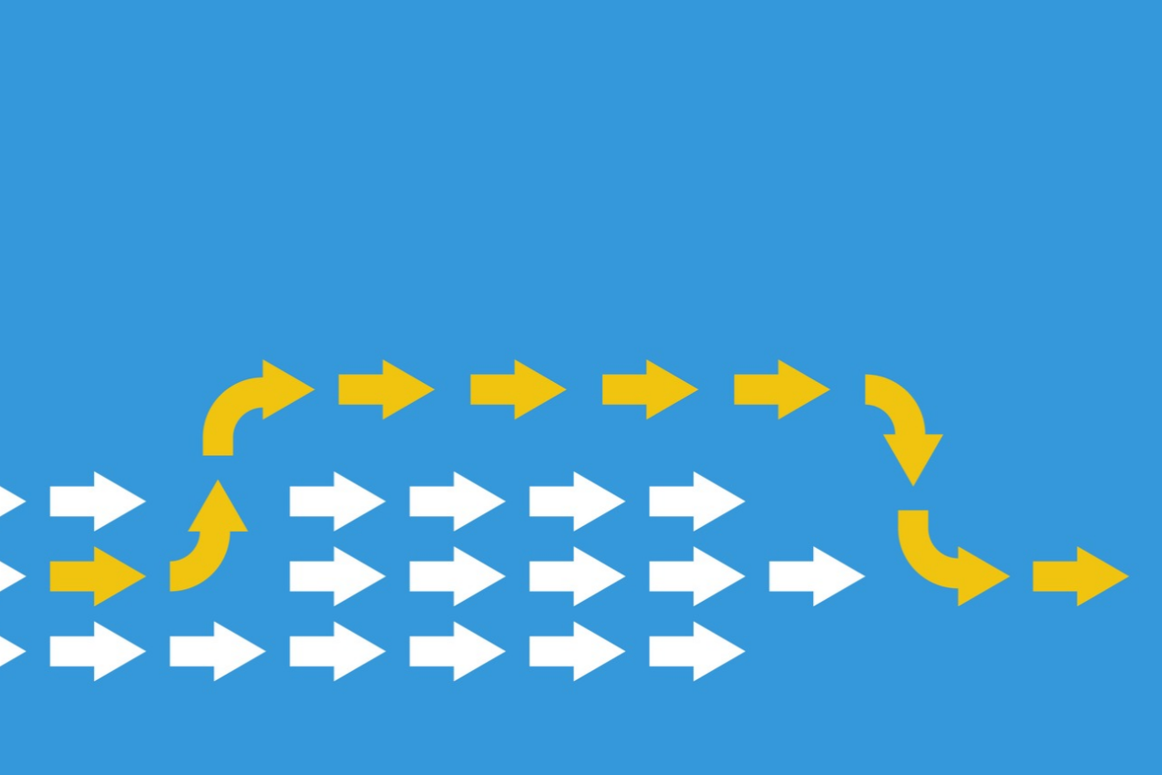 leadership concept with yellow and white arrows